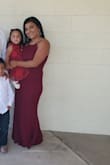 Loved how it fit! Had to get it tailored obviously since I'm really short but I loved the dress! Very forgiving and form-fitting. - Liz A.