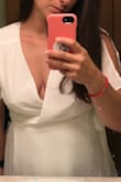 I really wanted to love this but it fit so awkwardly. (SIDE NOTE: I am 18 wks pregnant and have a little belly but that wasn't the awkward fit). It was so gappy in the chest area and shoulders that I sized down from a large to a medium but the medium was too tight around my waist and the top was still gappy and not flattering but had too much cleavage. Anyway, gave up and returned it all together! - Alison C.
