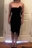 I'm an athletic build. It fits perfectly. Wearing without a bra and stays up. Only downside, length. Too long. - Shannon S.