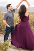 I wore this dress for our family photo session. The dress allowed for movement and had a great fit. The dress offers two points were you can tighten the fit: around the neck and around the waist. I'm smaller up top so this was perfect for me and shouldn't be an issue for women who are larger on top. Overall, I'm really happy I chose this dress and the color was perfect for the camera! - Veronica H.