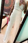 I wore this for my wedding celebration.  We eloped and had a causal party back home afterwards.  It was perfect, I loved it so much more than I thought I would... I did have to have the straps altered because it was a little too big and long for me, shortened the straps 1 inch and it lifted it off the ground just perfect. - Tabitha B.