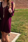 It's a soft, cotton dress that was perfect for gameday! It was slightly short for me and the little ties at the end of the sleeves seemed kind of unnecessary. But it was super flowy and I loved it! - Brooke L.