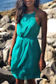 I was attending at summer wedding in Maine- I didn't want to wear black and this teal dress was the winner. I wore it to a midday catholic ceremony and for the next 12 hours of wedding events. Perfectly comfortable- I like that it has a high neck and I had nothing to worry about on that front. I wore a sticky bra with this dress. I initially ordered a small and then found that the torso/under arm area was a loose on me so I sent it in for an extra small. This fit me well, although probably a bit more fitted on my wider hips. Lulus was extremely prompt with both deliveries and receiving my return. I definitely think Lulus is the best and most affordable option for when you have a couple of weddings coming up and you are trying not to wear the same thing to all of them. - Nisha G.