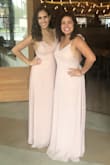 I wore this as a bridesmaid dress and it was flattering on all of us. It's very elegant and I absolutely loved the back of it. It was comfortable and it's a dress I can rewear again. - Sara K.