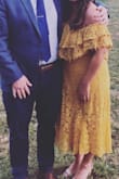I bought it for a fall wedding and loved everything about it! Was torn between sizes and went with the large and it fit perfectly even a tad too big so I would size down!! I received sooo many compliments all night long! - Nicollette B.