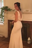 I absolutely loved this dress. It was comfortable and flattering. It is sexy but very classy. The only thing is I had to get it hemmed for length but that is expected. Highly recommend. - Rose D.