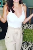 If you have boobs, it's a little difficult to pull over them, but otherwise fits beautifully. I bought this in both colors! - Kelly C.