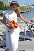 I absolutely love this dress! It is sexy without revealing too much. Simple yet elegant. I had it hemmed for 2 inches, and I wore 2-inch heels. - Barbi C.