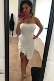 This dress is beautiful but the material is cloth and not forgiving at all. I ordered it a size too big, but took it in myself. The fabric was very think and required "no show" panties. a strapless bra, and a lot of sucking in. I think a different color would have been a better choice. - Aleesha M.