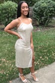 My daughter wore this dress to her homecoming. She received a lot of compliments. The material that the dress is made from allows room to move freely. It's not tight at all. - Jannie S.