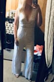 I bought this jumpsuit for my rehearsal dinner and it fits perfectly!! It's also really comfortable. I tried it on with a pair of heels and I don't even need to get it hemmed. Such a great buy!!! - Sarah T.