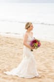 I wore this dress for my beach elopement in Maui and it couldn't have been more perfect! I I tried on several other dresses at bridal shops but I couldn't find anything that I liked more than this dress, especially for the price! It is extremely well made and the lace details are gorgeous.  It is a little see through but with a slip it was not an issue. I did have to have the length hemmed a bit I'm 5"1') but other than that it fit like a glove! I would absolutely recommend this dress! - Emily O.