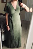 I ordered it as a bridesmaid dress, very elegant but also simple I like it a lot. Will confess it took me a solid 5 minutes (At least) to figure out how to put on, and still a little nervous about the wrap dress thing. Runs a little long on me, and is a size smaller than I usually wear which works great for everything else. Did come very wrinkled (as seen in the photo), I will have to steam it. But very pretty color, style, etc etc etc - Jadin M.