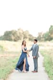 Fit great, has adjustable straps so you can adjust how low the top comes. Perfect for engagement photos! - Brooke M.