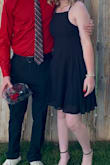My daughter wore this to homecoming and it was a huge hit. It fits her perfectly. She's a small/XS in most things. We went with the small because she's petite but has a larger bust. It did not disappoint. She was able to not wear a bra of any sort. It was also not too long which I was afraid of due to her height. - Ashley D.