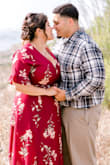 The fit was perfect except for the bust. I'm busty so I had to sew the bust area because I kept pooping the little button open. But I love this dress, I felt confident and beautiful while I wore it for my save the date photos. Material is good material, doesn't stretch but fits nicely. - Rita E.