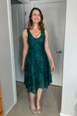 I felt pretty classy wearing this dress to a fall wedding. The more conservative midi length is really nice as the neckline is a little lower than I am used to. In retrospect I didn't need to wear a bra, as it made it a little tight up there, but apart from that it was very nice. The waist fit perfectly and many people complimented the colour. - Lauren H.