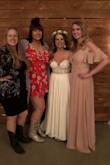 I wore this as a bridesmaid. I liked it for the most part. The picture is a little misleading cause there really isn't a slit. I also struggled all night with the cleavage, if I sat down or bent over it would gape all the way open. It is really long which is nice. I'm 5'11 and also wore 2 inch heels. Touched the ground. - Ashlee B.