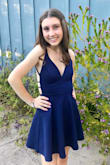 Loved it! Great fit and color, the fabric is a little stretchy and thick enough to not need a bra or pasties. Length is good, and the skater skirt is really flattering. Went with silver shoes but could have worn beige or black instead. - Linda K.