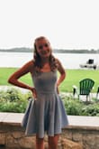 This dress was my homecoming dress this year, and I truly felt like Cinderella! The top half is tight-fitting to your body and really flattering, and the bottom half, waist down, is flowy. The dress is super comfy and I was able to dance the night away in this dress, with no problems at all! The material is also very thick, but not warm. Even though I was sweating, the dress didn't show any sweat marks or anything of that sort. 10/10 recommend! - Sage N.
