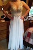 Beautiful dress. Love the slit and the lace up back. - Emily V.