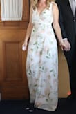 I wore this dress for my wedding and liked it pretty well. The material felt nice but was a bit frayed in places. It was definitely too long...I should have had it hemmed but didn't. Also it was too loose in the bust area and a bit tight in the waist. Overall it fit well but other medium lulus dresses have fit me better. - Katy S.