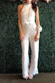 I loved this jumpsuit!! I wore this to my bridal shower and received so many compliments! I loved the lace detail and it was very comfortable. It did run a little large on me so I got it taken in on the sides and if you aren't tall the pants may be a little long but with the right heel you are good to go! I only wish I had somewhere else to where it to again! Love Lulus!! - Cara C.