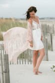 I wore this for my engagement shoot and it was perfect! Not see through at all. Very light and comfortable. - Kaitlyn S.