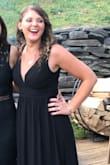 A deep V neck done in a very classy way. This dress is so flattering for curvy girls. I'm a very true hourglass and therefore can sometimes look a lot bigger than I actually am. The silhouette of this piece hides wide hips with a flowy skirt and shoes off a small waist. Just beautiful! - Patricia R.