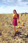 Love this dress! It's flirty but appropriate and great for fall photos. The material is light but not see-through, and a pretty cranberry color. - Julia R.