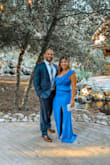 Amazing dress. Wore to a wedding and got a ton of compliments on it!  The color is absolutely beautiful, more of a royal blue than my edited picture. :) - Melena V.