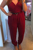 I'm in the groom's party at my best friend's wedding, and I thought this jumpsuit would be perfect. It's not, but it's too late to order anything else now. I'm between sizes, so I got a medium and a large. The medium was snug in the legs, but the top fit well. The top kind of bulged awkwardly at the sides though. The large fits my legs comfortably, but holy moly is the top way too big. It billows way out on one side and the back won't stay up. I'm going to use a belt to keep it bunched up and with a blazer over it hopefully it won't look too awkward. Far from my best Lulus purchase. Would not recommend. - Rebecca A.