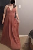 This color is really pretty, exactly as pictured. I'm 5'5" and it is just a bit long, but should be a good length with a heel. From the waist down is really high quality, and I love the crimped details on the skirt! Skirt is lined which is nice. The straps seem a little flimsy and are a bit hard to adjust. But I really love wearing this dress, you don't really even need a bra. Will be great for the wedding I am in! - Ashley B.