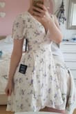 I love this dress so much! It has the prettiest floral pattern that I've ever seen on a dress. The material is soft and flowy, and makes you feel beautiful! I couldn't recommend the dress enough. 

There's such a vast difference between sizing on the site, that I'd be wary ordering dresses (especially if you will have to pay expensive customs charges) due to the unreliability. However, I can definitely vounch for this dress; it's beautiful, comfy and true to size! - Georgina H.