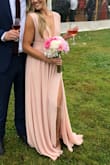 Love the pink color. The neckline was gorgeous for a smaller chest. I did have to use a lot of sticky tape so it stayed put. Give yourself time to hem the dress if you're under 5'6. - Lauren L.