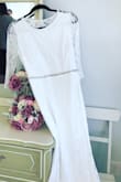 Purchased this dress for a quick and affordable wedding option. Over all, the fit was a little snug but true to the large size I ordered. Watch what I eat for two weeks and it fit like a glove. I did have to lengthen the lace hPurchased this dress for a quick and affordable wedding option. Over all the fit was a little snug but true to the large size I ordered. Watch what I eat for two weeks and it felt like a glove. I did have to lengthen the lace hem, which I have never had to do at my height. The under layers are long had to get those hemmed as well and ended up adding a belt. Overall I spent just over $100 on Alterations. For under $200 this was a perfect option for my quick wedding. - Paige P.
