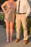 This dress was amazing! With it being sequence, it did scratch underneath my arms but other than that this dress was gorgeous! I got so many compliments on it. A regular bra doesn't really work with this dress so either buy a sticky bra or don't wear one. - Morgan G.