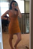 I got mine in the mustard yellow which is definitely a true mustard maybe even darker. I think it could be super flattering on many skin tones (even me who's paler than snow). the fit is pretty great but I think I will end up getting it hemmed (in the pic I have it folded to where I would hem it) and the straps are a little long because my torso is pretty short but If you're any taller than me I don't think those adjustments would be necessary. - Rachel W.