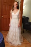 Tried this on as a potential wedding dress and loved it! (though it wasn't "THE" dress so I did return it). It was comfortable, beautiful, and flattering. Definitely a great dress for an elegant but simple look. Photo is when I tried it on at home before returning. - Courtney U.