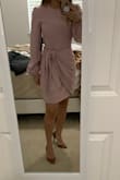 Typically I would order a XS since I am more on the petite size but I am wearing this to a baptism and wanted a looser fit. It fits very comfortably; elegant dress for a conservative occasion. Will say, the sleeves fit me a little longer. - Alexandra R.