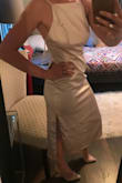 This dress is very pretty, however, runs large and has a little bit of an odd fit. I ordered the cream color in small but am returning it for an XS. I will be getting the dress hemmed to right above my knees as it's a bridesmaids dress, so hopefully that takes care of the odd fit. The length just does not look as flattering in person as it does in the pictures on Lulus. - Rebecca H.