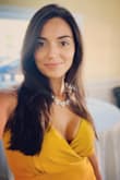 Beautiful mustard color gown. Great quality fabric. Runs a little big in my opinion. I had to get an XS as where I'm usually a size small. - Vanessa V.