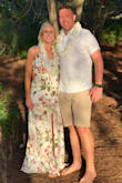 Bought this dress to renew my vows on our trip to Hawaii. Purchased a small after reading reviews. This fit like a glove, no wiggle room but wasn't not too tight at all. Hit me at all the right places. It was long and dragged unless I wore 4" wedges. I didn't wear a bra, layers/ruffle provided coverage and snug fit gave support.  Straps don't adjust, thankfully this wasn't a problem. I normally wear s/xs dresses from other stores(Target/OldNavy) and size 4 jeans. 
I front slit is a tad weird, but works. It would have been a nice touch if the fake button design went all the way down and made the slit seam more natural. - Catie H.