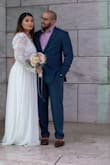 Absolutely loved this dress on me! Wore it for my wedding ceremony and it looked beautiful. Sleeves ran a lil long on me as well and dress length, with heels. Only thing I would change is material it was just weird. Not extremely uncomfortable but I got what I paid for. - Johnna C.