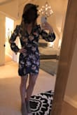 This dress is a great find for the price. Fits really well, doesn't show off too much chest and isn't overly short. 
Totally recommend! - Jane K.