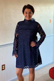 I was in love with how this dress looked in The picture, but this is not how it turned out. I did not hate it but I was not crazy about it. The collar can be suffocating. If I would have stuck with this dress I would have ordered a size down. A little shorter than I hoped also. - Samantha G.
