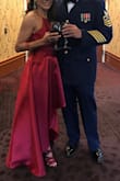 It is absolutely stunning! I was looking for a formal dress for a military dinner that was different in cut and fabric. When I saw this dress, and in red, it was like a dream. The color is gorgeous and the fabric is not flimsy. The front and back stay just like that. It did not wrinkle in a garment bag (folded) after a long flight from VA to CA. This dress looks and feels like an expensive designer gown. - Margaux B.