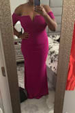 Took a quick pic and in love with this dress. Bought the large and while it hits every curve it's not uncomfortable at all. You probably don't need a shaper as the material is thick and stretchy. Worth it! - Shawna F.
