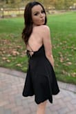 I was a little worries that the fit would be very loose because I'm so small, but it got great. You can wear it without a bra and adjust the straps by tying it to your desired fit. It's perfect and so beautiful!! My only complaint is that it was a little difficult to get into the dress by yourself with all of the busy strings in the way, but I managed! - Rhyleigh A.
