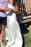 Runs a little large, normally wear a small but XS fit well. Wore it for my engagement party and it was beautiful!! - Nicole Y.